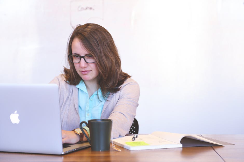 Woman on laptop buying a cruise deal